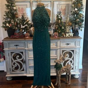 Full length halter top embellished party dress.. some damage at the bottom